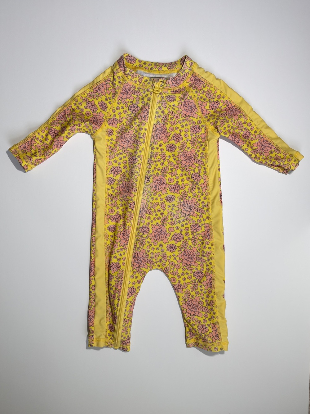 Baby girl yellow and pink SwimZip full coverage one-piece swimsuit